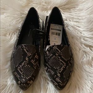 Gray white black memory foam Snake print shoes.